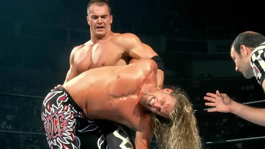 https://cultaholic.com/files/images/ec3479f97ca2b32c2be7721181669ef3d93a00e3-edge-lance-storm-summerslam-2001.jpg